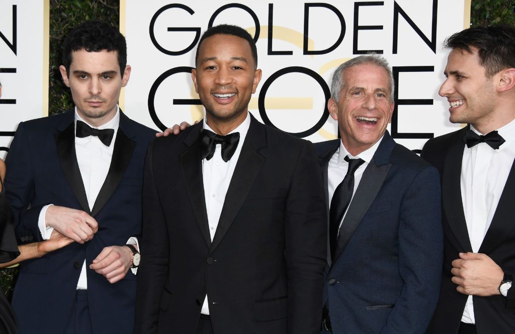 BEVERLY HILLS, CA - JANUARY 08: (L-R) Director Damien Chazelle, musician John Legend, producer Marc Platt and lyricist  Benj Pasek attend the 74th Annual Golden Globe Awards at The Beverly Hilton Hotel on January 8, 2017 in Beverly Hills, California.  (Photo by Frazer Harrison/Getty Images)