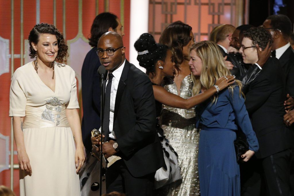 BEVERLY HILLS, CA - JANUARY 08: In this handout photo provided by NBCUniversal, director Barry Jenkins and the cast and crew of "Moonlight" accept the award for Best Motion Picture - Drama for "Moonlight" onstage during the 74th Annual Golden Globe Awards at The Beverly Hilton Hotel on January 8, 2017 in Beverly Hills, California. (Photo by Paul Drinkwater/NBCUniversal via Getty Images)