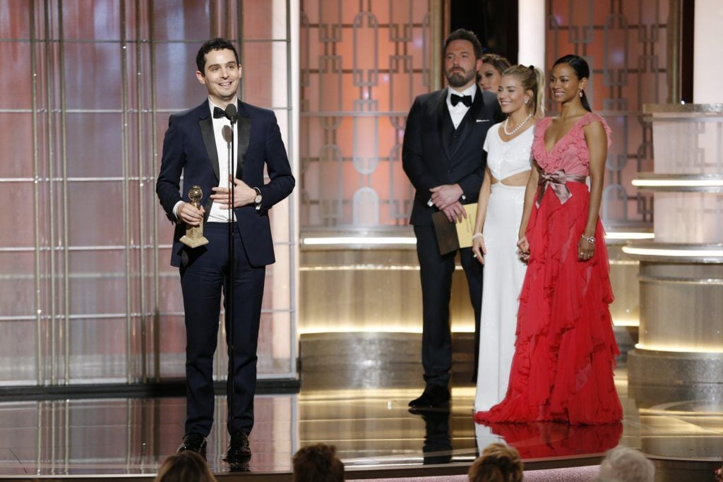 BEVERLY HILLS, CA - JANUARY 08: In this handout photo provided by NBCUniversal, Damien Chazelle accepts the award for Best Director - Motion Picture for " La La Land" onstage during the 74th Annual Golden Globe Awards at The Beverly Hilton Hotel on January 8, 2017 in Beverly Hills, California. (Photo by Paul Drinkwater/NBCUniversal via Getty Images)