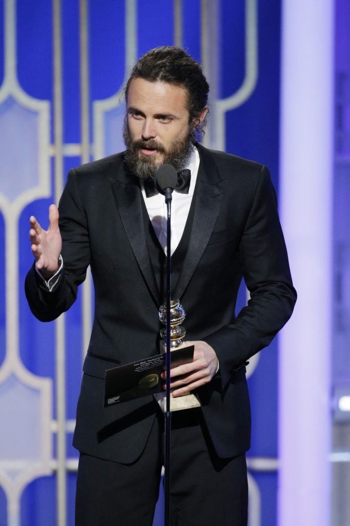 BEVERLY HILLS, CA - JANUARY 08: In this handout photo provided by NBCUniversal, Casey Affleck accepts the award for Best Actor in a Motion Picture - Drama for his role in "Manchester by the Sea" onstage during the 74th Annual Golden Globe Awards at The Beverly Hilton Hotel on January 8, 2017 in Beverly Hills, California. (Photo by Paul Drinkwater/NBCUniversal via Getty Images)