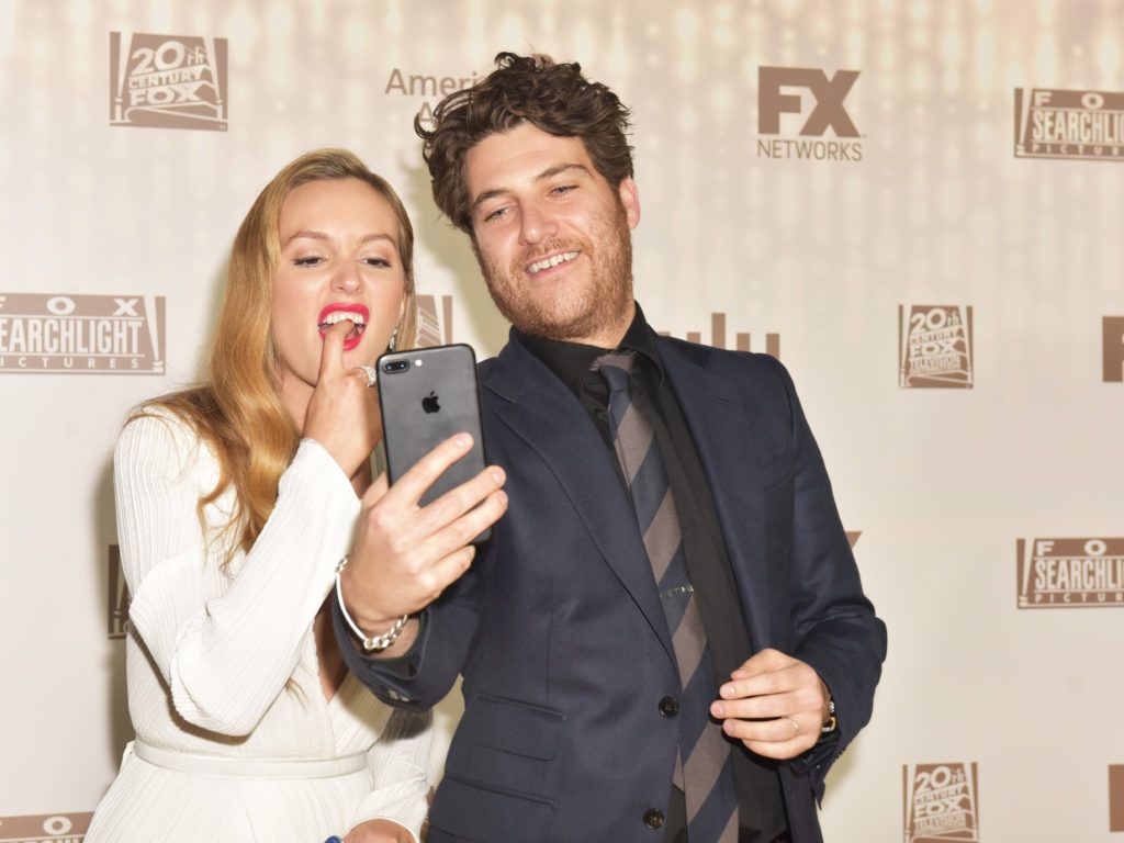 BEVERLY HILLS, CA - JANUARY 08:  Actors Leighton Meester (L) and Adam Pally attend FOX and FX's 2017 Golden Globe Awards after party at The Beverly Hilton Hotel on January 8, 2017 in Beverly Hills, California.  (Photo by Rodin Eckenroth/Getty Images)