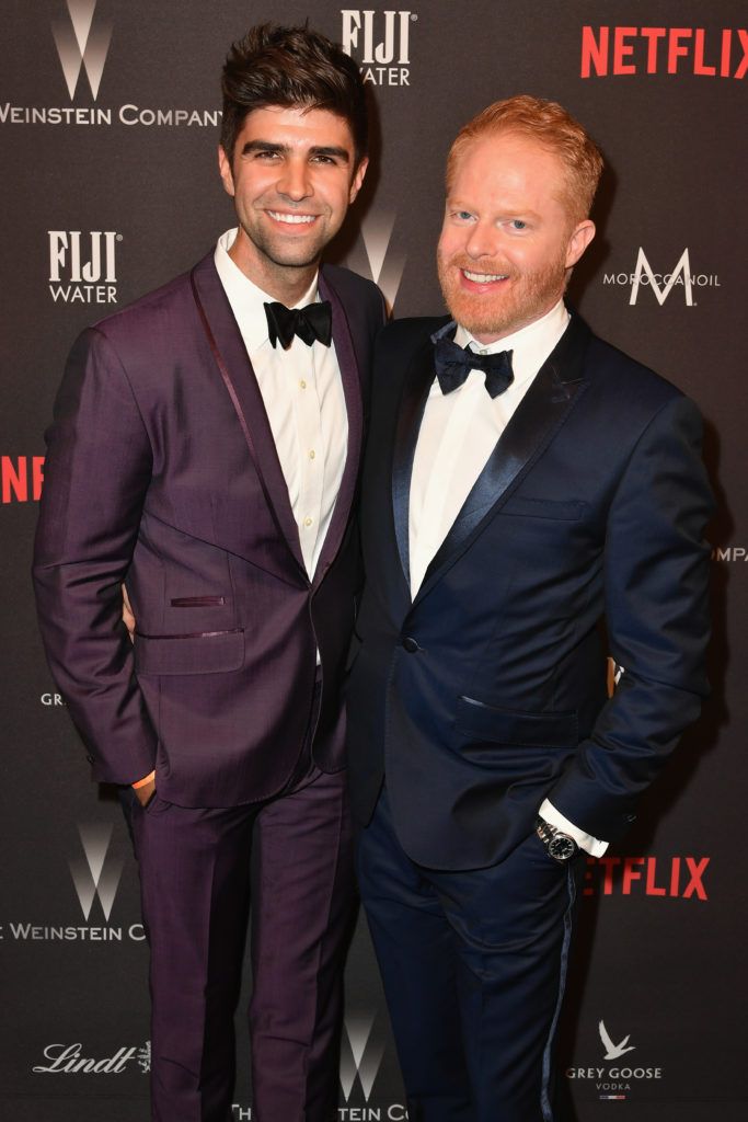 BEVERLY HILLS, CA - JANUARY 08:  Actor Jesse Tyler  Ferguson (R) and actor Justin Mikita attend The Weinstein Company and Netflix Golden Globe Party, presented with FIJI Water, Grey Goose Vodka, Lindt Chocolate, and Moroccanoil at The Beverly Hilton Hotel on January 8, 2017 in Beverly Hills, California.  (Photo by Earl Gibson III/Getty Images)