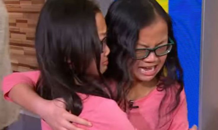 Identical twins separated at birth meet for the first time ever on live TV