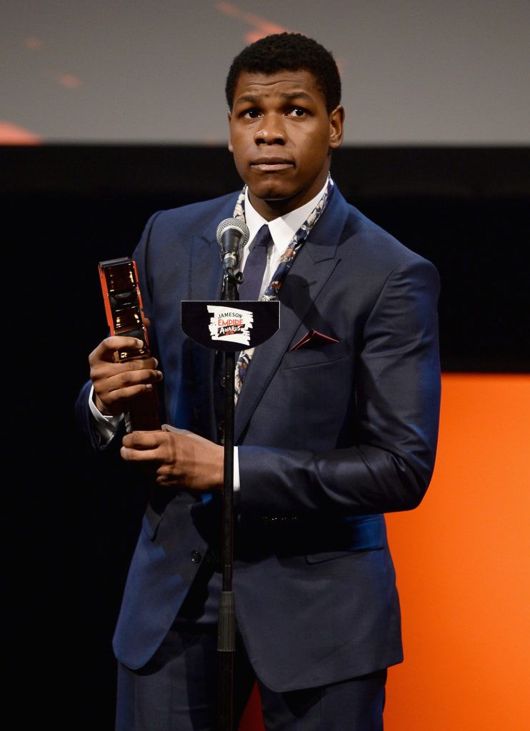 John Boyega accepts the award for Best Male Newcomer on stage during the Jameson Empire Awards 2016 at The Grosvenor House Hotel on March 20, 2016 in London, England.  (Photo by Jeff Spicer/Getty Images)