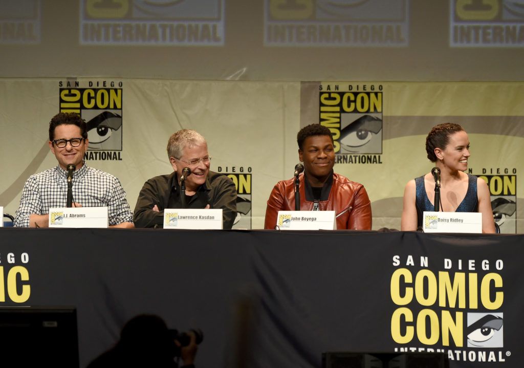Director J.J. Abrams, screenwriter Lawrence Kasdan, actors John Boyega and Daisy Ridley speak onstage at the Lucasfilm panel during Comic-Con International 2015 at the San Diego Convention Center on July 10, 2015 in San Diego, California.  (Photo by Kevin Winter/Getty Images)