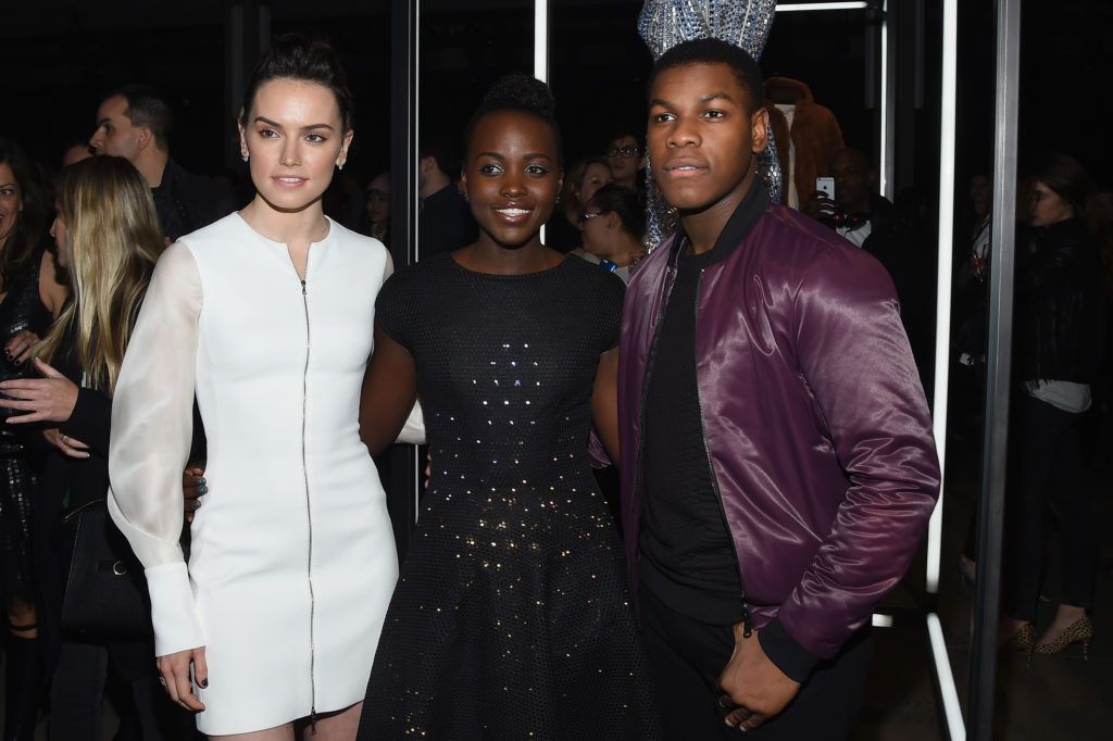 Daisy Ridley, Lupita Nyong'o, and John Boyega attend the Star Wars "Force 4 Fashion" Event on Dec. 2 at the Skylight Modern in NYC. Top designers showcased bespoke looks inspired by characters from Star Wars: The Force Awakens that will be auctioned off for Bloomingdales holiday charity.  (Photo by Larry Busacca/Getty Images for Disney Consumer Products)