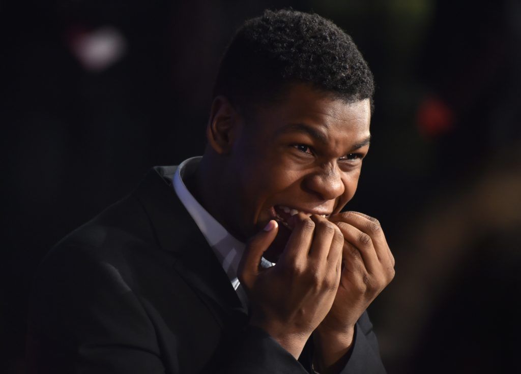 Actor John Boyega poses during a promotional event for the upcoming Star Wars film in Tokyo on December 10, 2015. Star Wars: The Force Awakens premieres in Japan on December 18. (Photo KAZUHIRO NOGI/AFP/Getty Images)
