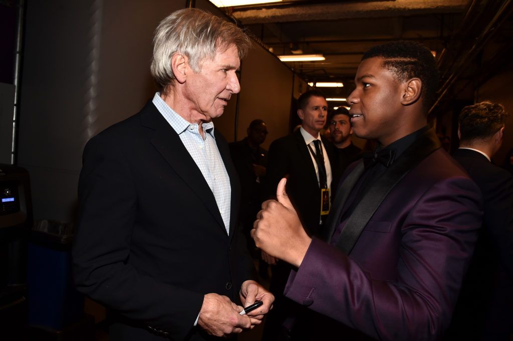 Harrison Ford (L) and John Boyega attend the World Premiere of Star Wars: The Force Awakens at the Dolby, El Capitan, and TCL Theatres on December 14, 2015 in Hollywood, California.  (Photo by Alberto E. Rodriguez/Getty Images for Disney)