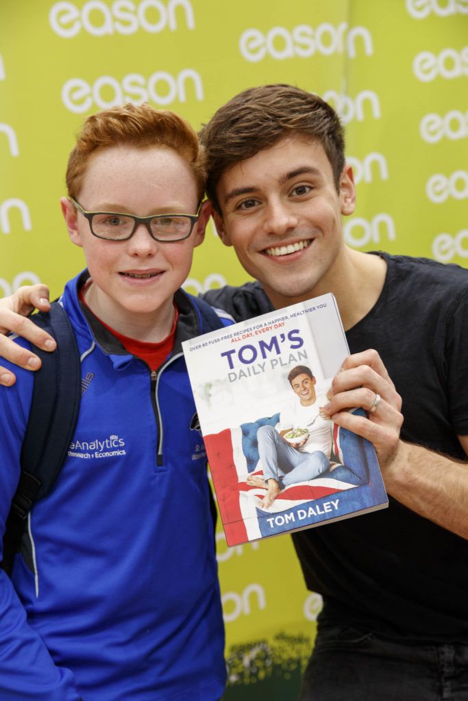 British Diving Olympian, Tom Daley, pictured with Dylan Egan (14) from Howth  who plays water polo for Ireland in Eason Dundrum Town Centre where he was signing copies of his new book, Tom’s Daily Plan. Picture Andres Poveda