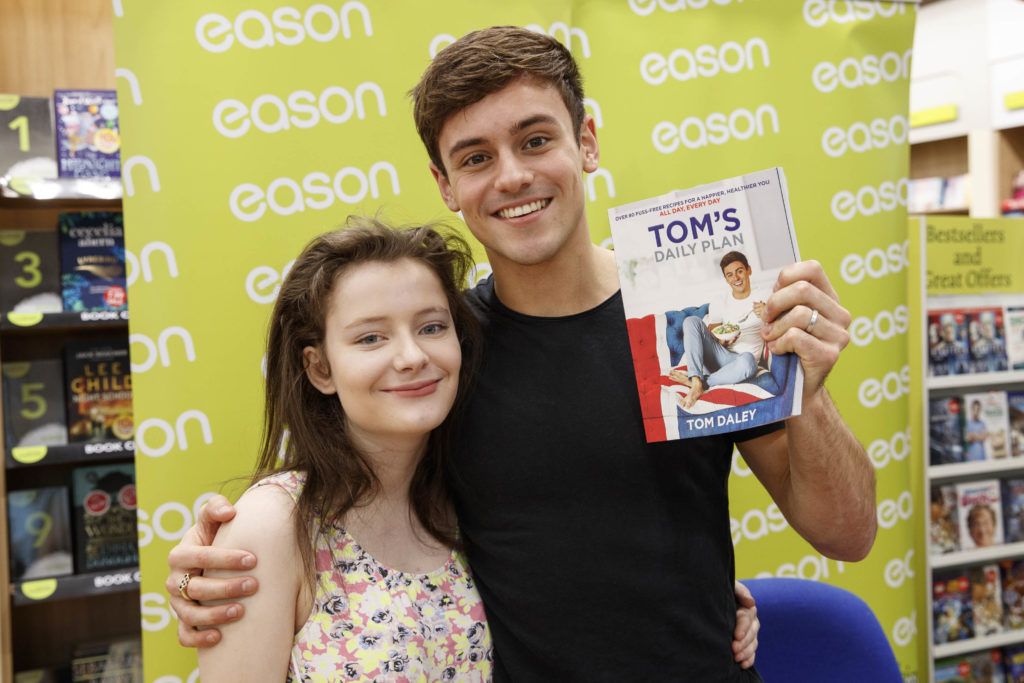 British Diving Olympian, Tom Daley, pictured with Clare Keenan (17) from Kimmage in Eason Dundrum Town Centre where he was signing copies of his new book, Tom’s Daily Plan. Picture Andres Poveda