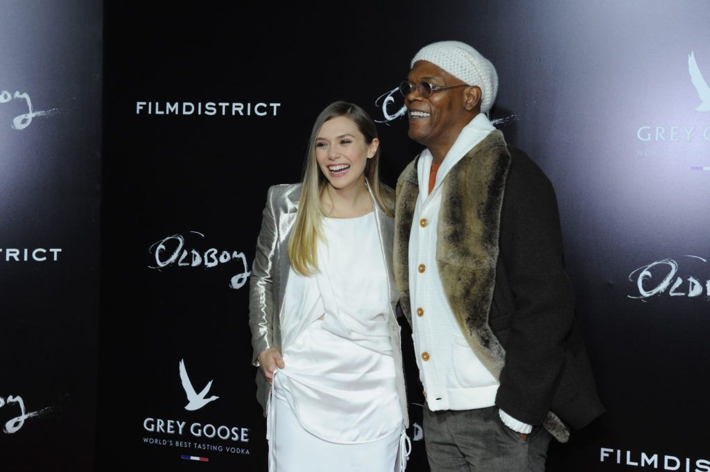 Elizabeth Olsen and Samuel L. Jackson  attend the screening of "Oldboy" hosted by FilmDistrict and Complex Media with the Cinema Society and Grey Goose at AMC Lincoln Square Theater on November 11, 2013 in New York City.  (Photo by Ilya S. Savenok/Getty Images)