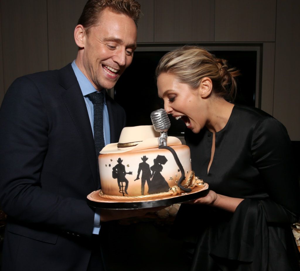 Tom Hiddleston (L) and Elizabeth Olsen attend Sony Pictures Classics after party for "I Saw The Light" sponsored by Lacoste and Ciroc at The Addison Residence on September 11, 2015 in Toronto, Canada.  (Photo by Todd Williamson/Getty Images for Sony Pictures Classics)