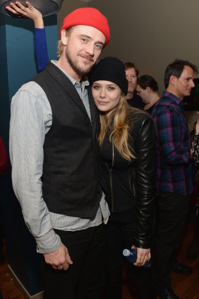 Boyd Holbrook and actress Elizabeth Olsen attend GREY GOOSE Blue Door Hosts "Skeleton Twins" Dinner on January 18, 2014 in Park City, Utah.  (Photo by Jamie McCarthy/Getty Images for GREY GOOSE)
