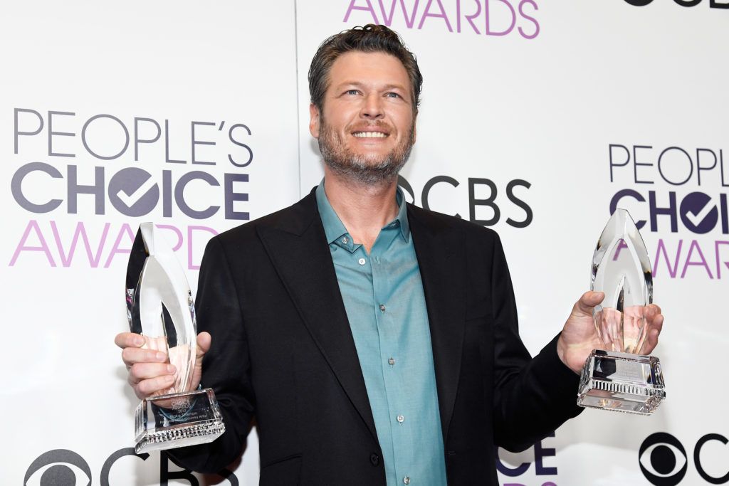 LOS ANGELES, CA - JANUARY 18:  Singer/Songwriter Blake Shelton, winner of the Favorite Male Country Artist Award and Favorite Album "If I am Honest", poses with awards, backstage at the People's Choice Awards 2017 at Microsoft Theater on January 18, 2017 in Los Angeles, California.  (Photo by Kevork Djansezian/Getty Images)