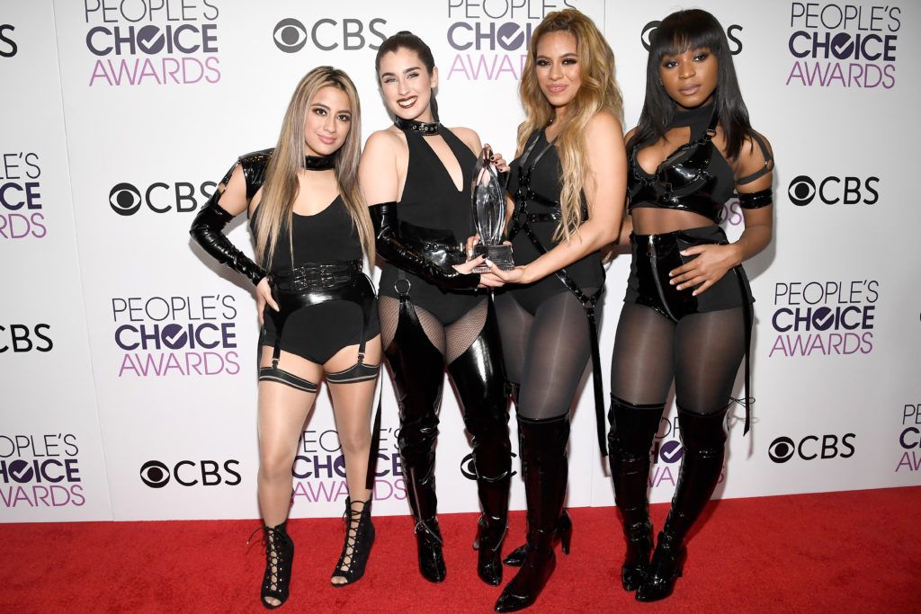 LOS ANGELES, CA - JANUARY 18:  (L-R) Singers Dinah Jane, Lauren Jauregui, Ally Brooke and  Normani Kordei of Fifth Harmony, winners of the Favorite Group Award pose in the press room during the People's Choice Awards 2017 at Microsoft Theater on January 18, 2017 in Los Angeles, California.  (Photo by Kevork Djansezian/Getty Images)