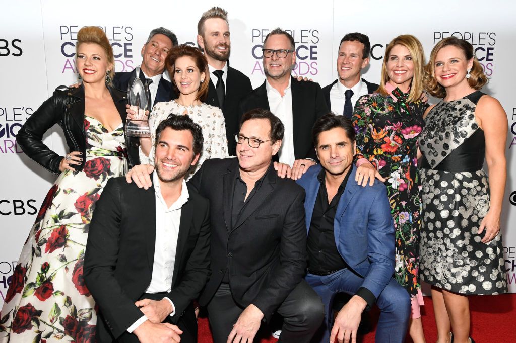 LOS ANGELES, CA - JANUARY 18:  (Back L-R) Actress Jodie Sweetin, producer Jeff Franklin, actors Candace Cameron Bure, John Brotherton, Dave Coulier, Scott Weinger, Lori Loughlin, Andrea Barber and (front L-R) actors Juan Pablo Di Pace, Bob Saget and John Stamos, winners of the Favorite Premium Comedy Series Award, 'Fuller House' pose in the press room during the People's Choice Awards 2017 at Microsoft Theater on January 18, 2017 in Los Angeles, California.  (Photo by Kevork Djansezian/Getty Images)
