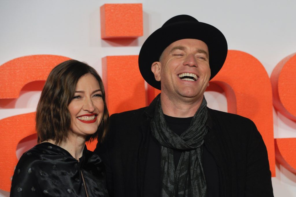 British actor Ewan McGregor (R) poses with British actress Kelly Macdonald (L) on the red carpet arriving to attend the world premiere of the film T2 Trainspotting in Edinburgh on January 22, 2017. (Photo ANDY BUCHANAN/AFP/Getty Images)
