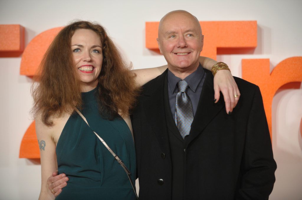 British author Irvine Welsh (R) and Beth Quinn (L) pose on the red carpet arriving to attend the world premiere of the film T2 Trainspotting in Edinburgh on January 22, 2017. (Photo ANDY BUCHANAN/AFP/Getty Images)