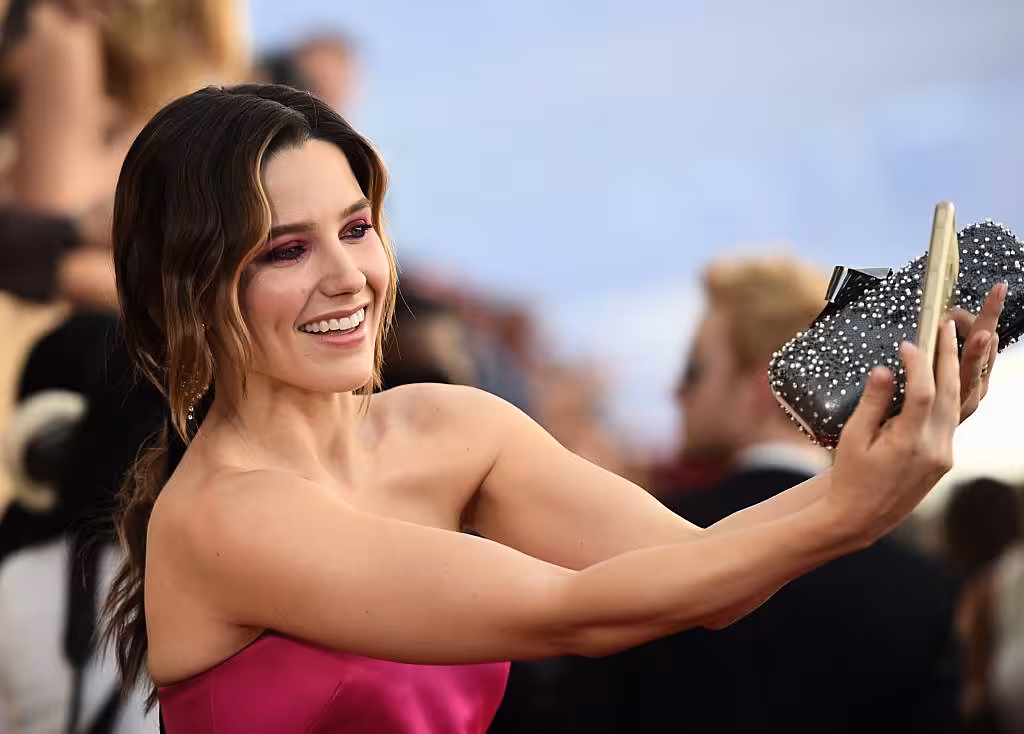 Sophia Bush takes a photo with fans as she arrives for the 23rd Annual Screen Actors Guild Awards at the Shrine Exposition Center on January 29, 2017, in Los Angeles, California. (Photo ROBYN BECK/AFP/Getty Images)