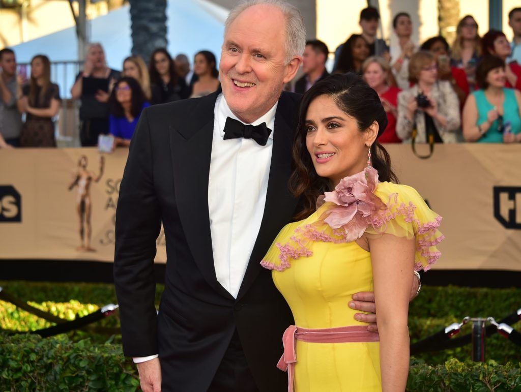 Actors John Lithgow and Salma Hayek arrive for the 23rd Annual Screen Actors Guild Awards at the Shrine Exposition Center on January 29, 2017, in Los Angeles, California.   (Photo FREDERIC J. BROWN/AFP/Getty Images)