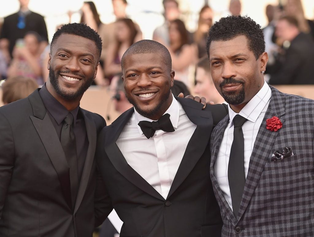LOS ANGELES, CA - JANUARY 29:  (L-rR) Actors Aldis Hodge, Edwin Hodge and Deon Cole attend the 23rd Annual Screen Actors Guild Awards at The Shrine Expo Hall on January 29, 2017 in Los Angeles, California.  (Photo by Alberto E. Rodriguez/Getty Images)