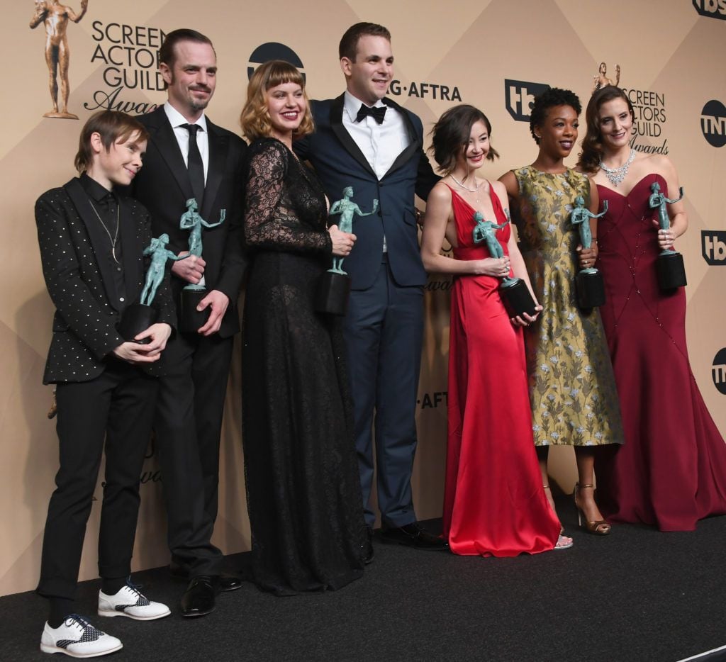 LOS ANGELES, CA - JANUARY 29:  (L-R) Actors Abigail Savage, James McMenamin, Emily Althaus, Alan Aisenberg, Kimiko Glenn, Samira Wiley, and Julie Lake, co-winners of the Outstanding Performance by an Ensemble in a Comedy Series award for 'Orange Is the New Black,' pose in the press room during the 23rd Annual Screen Actors Guild Awards at The Shrine Expo Hall on January 29, 2017 in Los Angeles, California.  (Photo by Alberto E. Rodriguez/Getty Images)