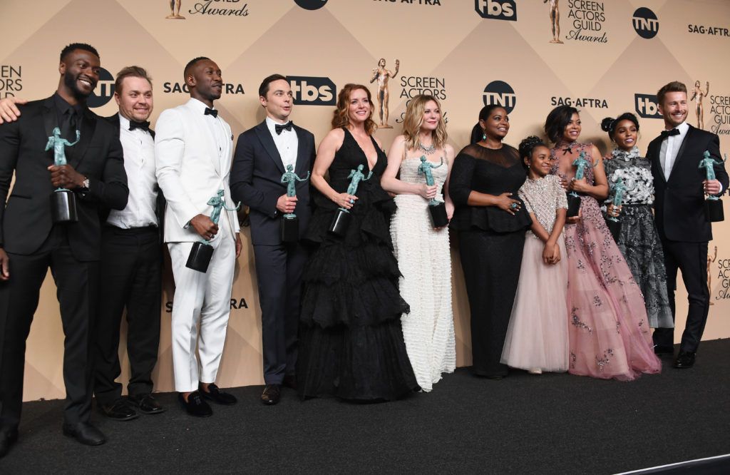 LOS ANGELES, CA - JANUARY 29:  (L-R) Actor Aldis Hodge, filmmaker Theodore Melfi, actors Mahershala Ali, Jim Parsons, Kimberly Quinn, Kirsten Dunst, Octavia Spencer, Saniyya Sidney, Taraji P. Henson, Janelle Monae, and Glen Powell, co-recipients of the Outstanding Performance by a Cast in a Motion Picture award for 'Hidden Figures,' pose in the press room during the 23rd Annual Screen Actors Guild Awards at The Shrine Expo Hall on January 29, 2017 in Los Angeles, California.  (Photo by Alberto E. Rodriguez/Getty Images)