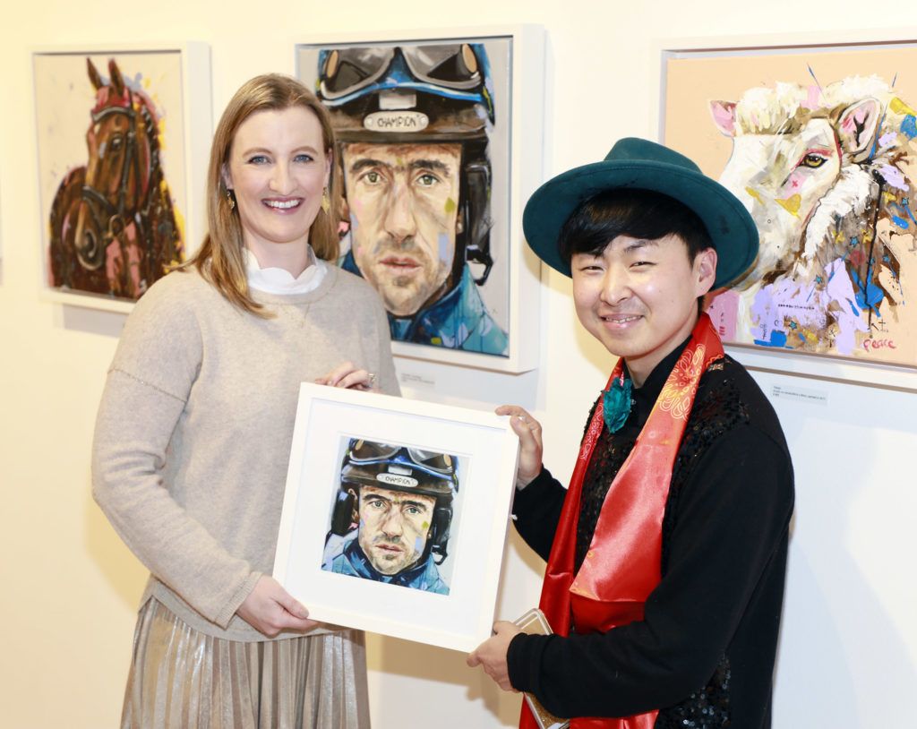 Gillian Walsh and Jin Yong at the launch of A celebration of Irish icons - Past and Present by Korean Chinese visual artist, Jin Yong, in Kildare Village as part of the Dublin Chinese New Year celebrations. Photo Kieran Harnett