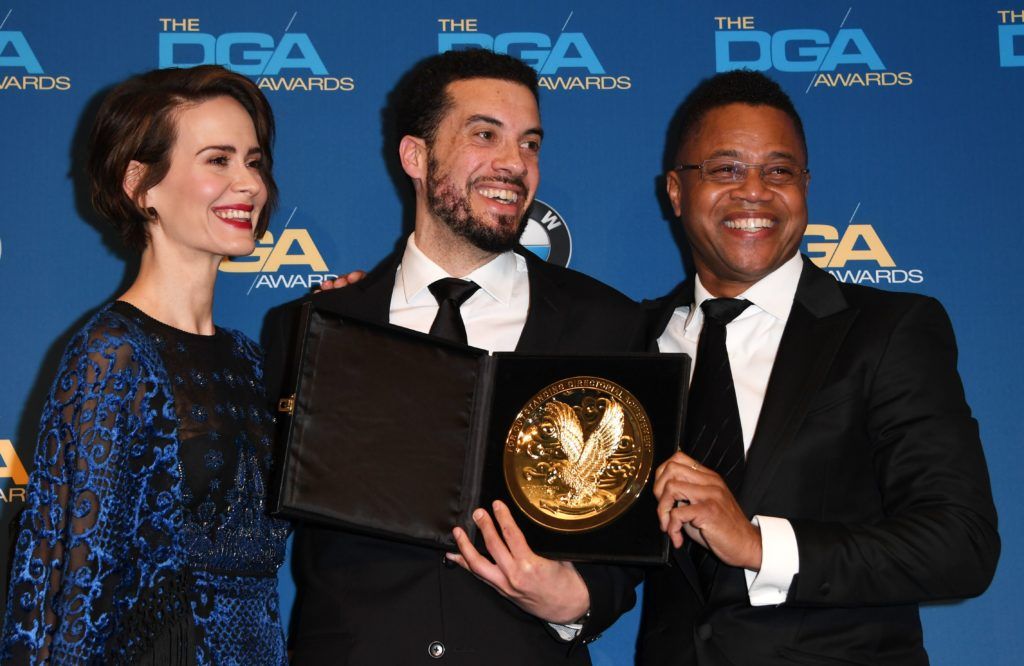 Director Ezra Edelman poses with the award for Best Director of a Documentary for "O.J.: Made In America," with actors Sarah Paulson (L) and Cuba Gooding Jr (R), in the press room at the 69th Annual Directors Guild Awards (DGA), February 4, 2017 in Beverly Hills, California.   (Photo MARK RALSTON/AFP/Getty Images)