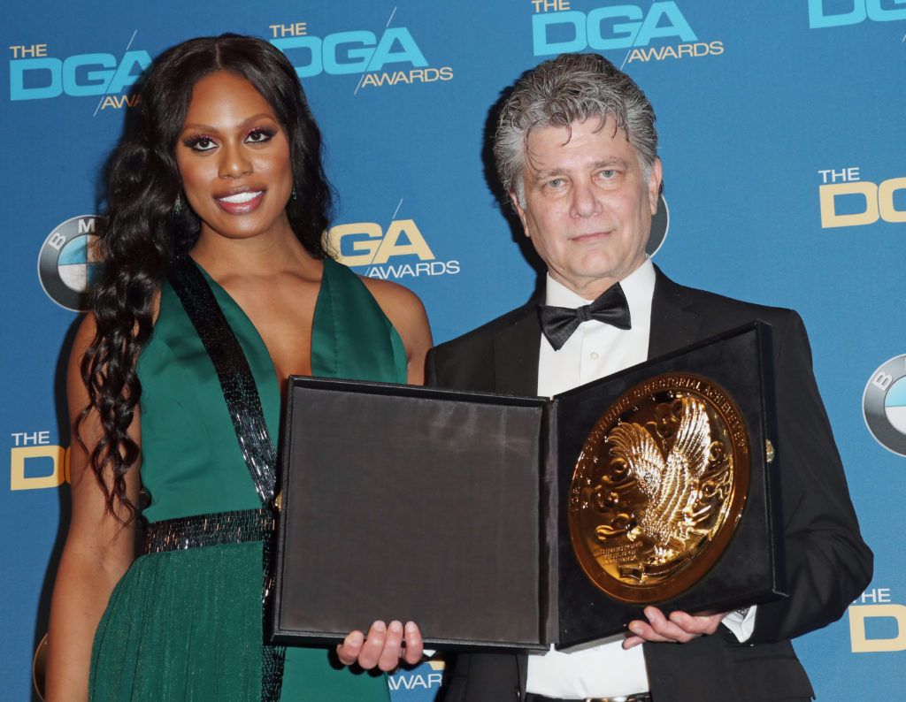 Director Steven Zaillian (R), winner of the Outstanding Directorial Achievement for Movies for Television & Mini-Series for 'The Night Of,' poses with actress Laverne Cox in the press room during the 69th Annual Directors Guild of America Awards at The Beverly Hilton Hotel on February 4, 2017 in Beverly Hills, California.  (Photo by Frederick M. Brown/Getty Images)