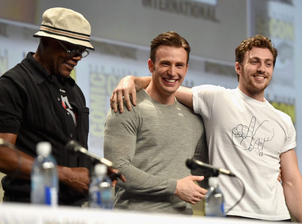 Actors Samuel L. Jackson, Chris Evans and Aaron Taylor-Johnson onstage at Marvel's Hall H Panel for "Avengers: Age Of Ultron" during Comic-Con International 2014 at San Diego Convention Center at  on July 26, 2014 in San Diego, California.  (Photo by Alberto E. Rodriguez/Getty Images for Disney)