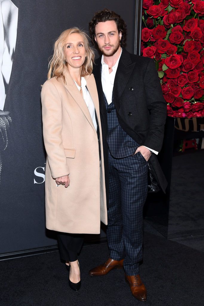 Director Sam Taylor-Johnson (L) and actor Aaron Taylor-Johnson attend the "Fifty Shades Of Grey" New York Fan First screening at Ziegfeld Theatre on February 6, 2015 in New York City.  (Photo by Mike Coppola/Getty Images)