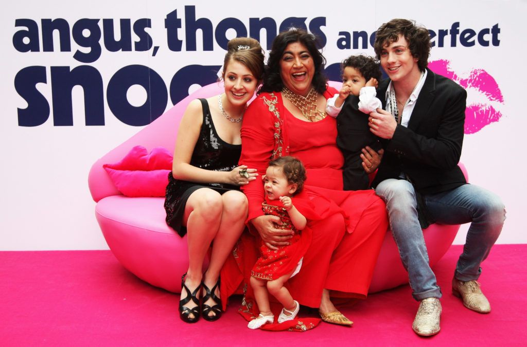 Actress Georgia Groome, Director Gurinder Chadha and her two children and Aaron Johnson pose for a photograph at the Empire Leicester Square during the UK Premiere of her film, Angus, Thongs and Perfect Snogging on July 16, 2008 in London, England.  (Photo by Chris Jackson/Getty Images)