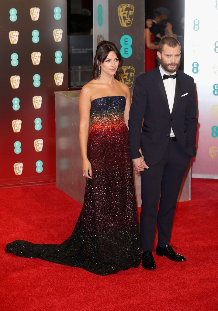LONDON, ENGLAND - FEBRUARY 12:  Amelia Warner and Jamie Dornan attend the 70th EE British Academy Film Awards (BAFTA) at Royal Albert Hall on February 12, 2017 in London, England.  (Photo by Chris Jackson/Getty Images)