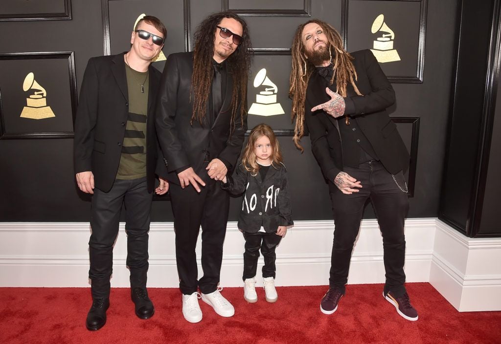 LOS ANGELES, CA - FEBRUARY 12: (L-R) Musicians Ray Luzier of Korn, James Shaffer of Korn, son D'Angelo Draxon Shaffer and Brian Welch of Korn attend The 59th GRAMMY Awards at STAPLES Center on February 12, 2017 in Los Angeles, California.  (Photo by Alberto E. Rodriguez/Getty Images for NARAS)