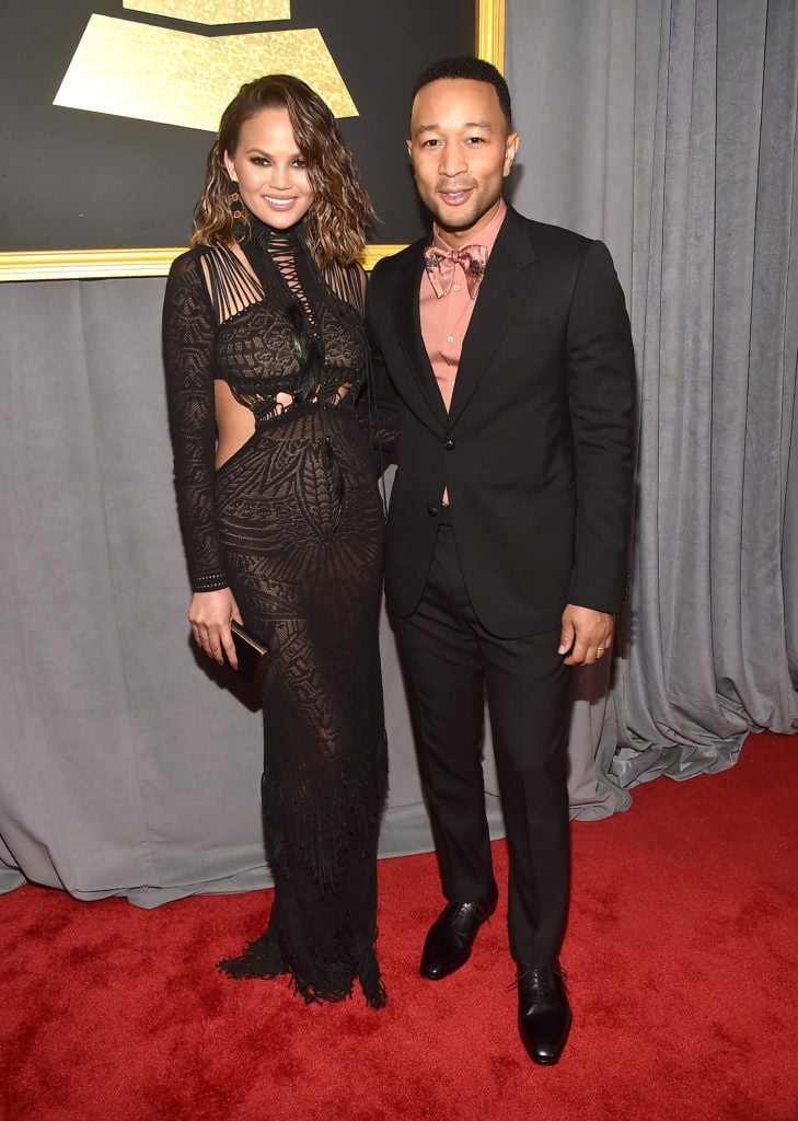 LOS ANGELES, CA - FEBRUARY 12: Model/Media Personality Chrissy Teigen and musician John Legend attends The 59th GRAMMY Awards at STAPLES Center on February 12, 2017 in Los Angeles, California.  (Photo by Alberto E. Rodriguez/Getty Images for NARAS)