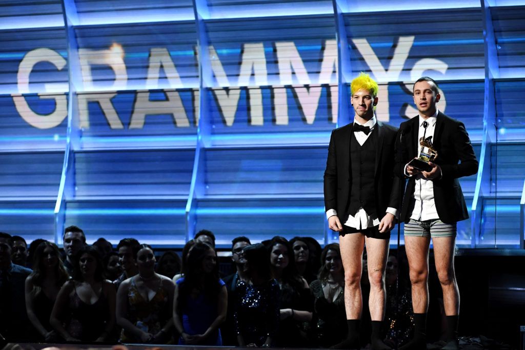 LOS ANGELES, CA - FEBRUARY 12: Recording artists Josh Dun (L) and Tyler Joseph of Twenty One Pilots, accept the award for Best Pop Duo/Group Performance, onstage during The 59th GRAMMY Awards at STAPLES Center on February 12, 2017 in Los Angeles, California.  (Photo by Kevork Djansezian/Getty Images)