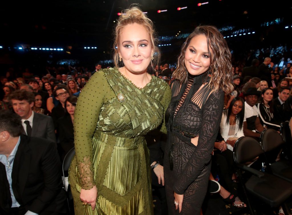 LOS ANGELES, CA - FEBRUARY 12:  Singer Adele (L) and media personality Chrissy Teigen during The 59th GRAMMY Awards at STAPLES Center on February 12, 2017 in Los Angeles, California.  (Photo by Christopher Polk/Getty Images for NARAS)