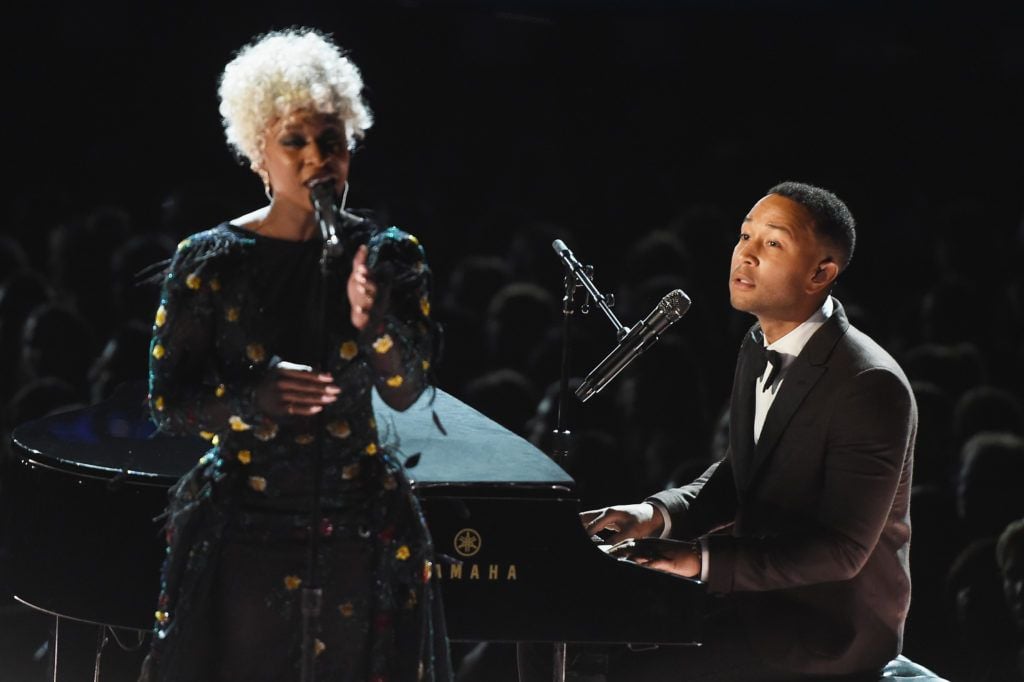 LOS ANGELES, CA - FEBRUARY 12:  Recording artists Cynthia Erivo (L) and John Legend perform onstage during The 59th GRAMMY Awards at STAPLES Center on February 12, 2017 in Los Angeles, California.  (Photo by Kevin Winter/Getty Images for NARAS)