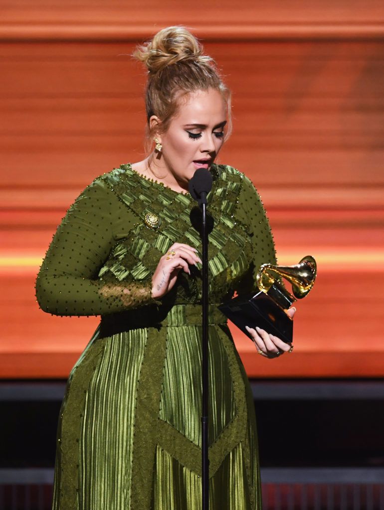 LOS ANGELES, CA - FEBRUARY 12:  Songwriter Adele Adkins accepts the Song Of The Year award for 'Hello' onstage during The 59th GRAMMY Awards at STAPLES Center on February 12, 2017 in Los Angeles, California.  (Photo by Kevin Winter/Getty Images for NARAS)