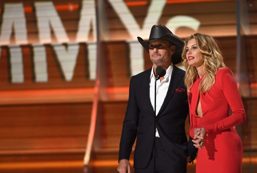 LOS ANGELES, CA - FEBRUARY 12:  Recording artists Tim McGraw (L) and Faith Hill speak onstage during The 59th GRAMMY Awards at STAPLES Center on February 12, 2017 in Los Angeles, California.  (Photo by Kevork Djansezian/Getty Images)