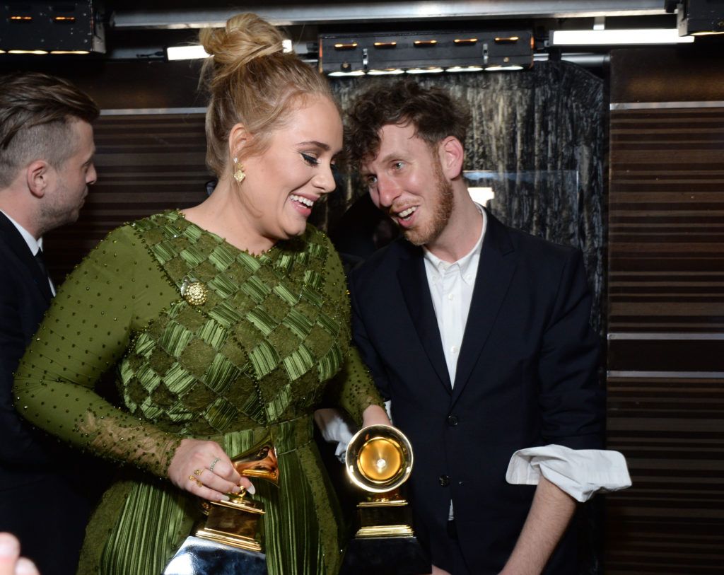 LOS ANGELES, CA - FEBRUARY 12: Recording artist Adele (L) and producer Ariel Rechtshaid (R), co-recipients of the Album Of The Year award for '25,' pose backstage during the The 59th GRAMMY Awards at STAPLES Center on February 12, 2017 in Los Angeles, California.  (Photo by Michael Kovac/Getty Images for NARAS)