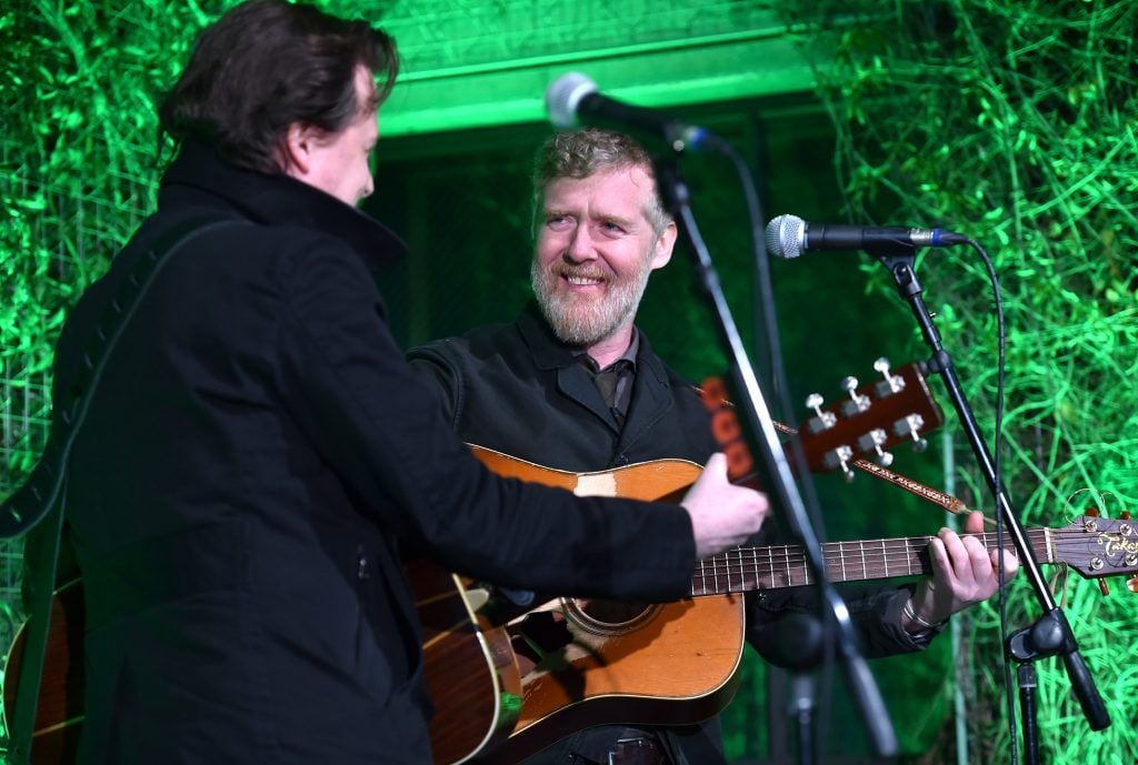 Musician Colin Devlin (L) and honoree Glen Hansard perform onstage during the 12th Annual US-Ireland Aliiance's Oscar Wilde Awards event at Bad Robot on February 23, 2017 in Santa Monica, California.  (Photo by Alberto E. Rodriguez/Getty Images for US-Ireland Alliance )