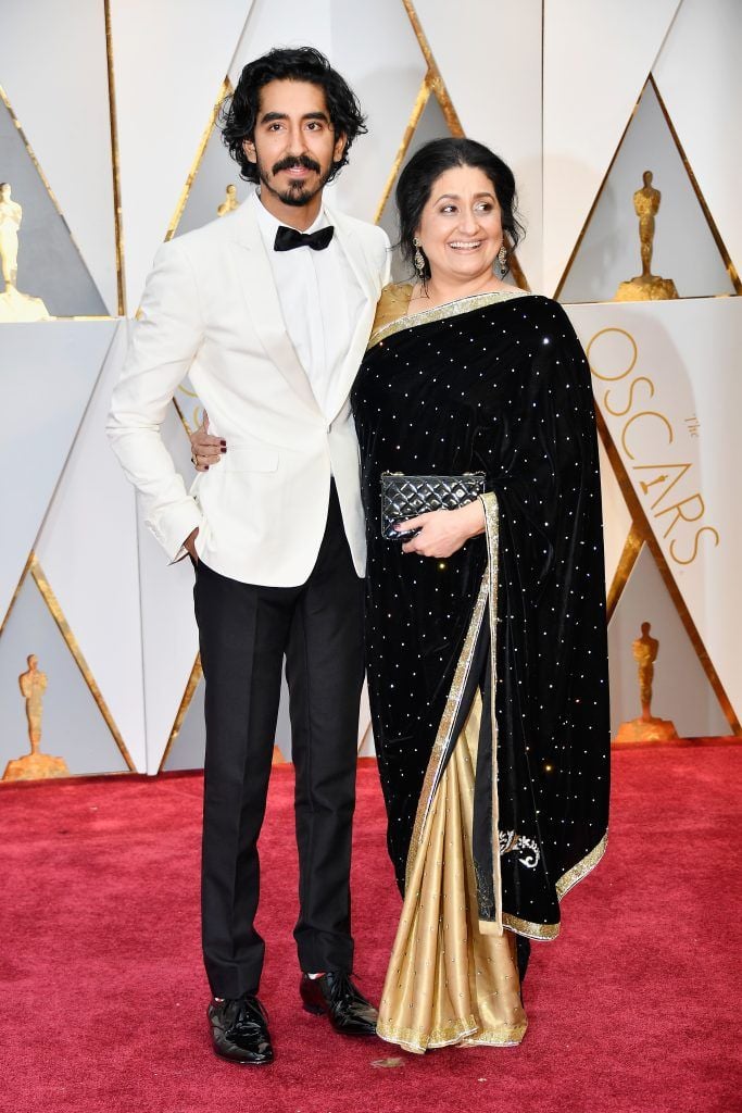 HOLLYWOOD, CA - FEBRUARY 26:  Actor Dev Patel (L) and Anita Patel attend the 89th Annual Academy Awards at Hollywood & Highland Center on February 26, 2017 in Hollywood, California.  (Photo by Frazer Harrison/Getty Images)