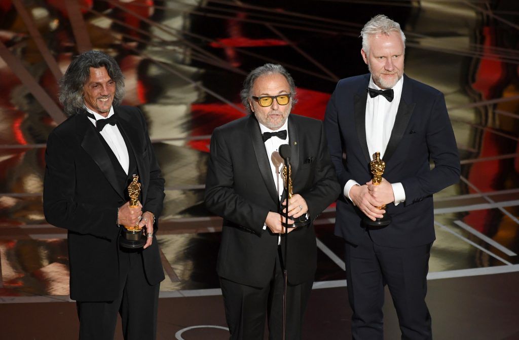 HOLLYWOOD, CA - FEBRUARY 26:  (L-R) Makeup artists Giorgio Gregorini, Alessandro Bertolazzi and Christopher Nelson accept Best Makeup and Hairstyling for 'Suicide Squad' onstage during the 89th Annual Academy Awards at Hollywood & Highland Center on February 26, 2017 in Hollywood, California.  (Photo by Kevin Winter/Getty Images)