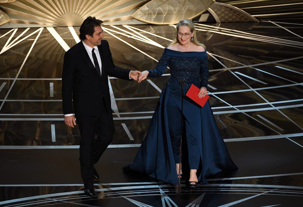 HOLLYWOOD, CA - FEBRUARY 26:  Actors Javier Bardem (L) and Meryl Streep speak onstage during the 89th Annual Academy Awards at Hollywood & Highland Center on February 26, 2017 in Hollywood, California.  (Photo by Kevin Winter/Getty Images)