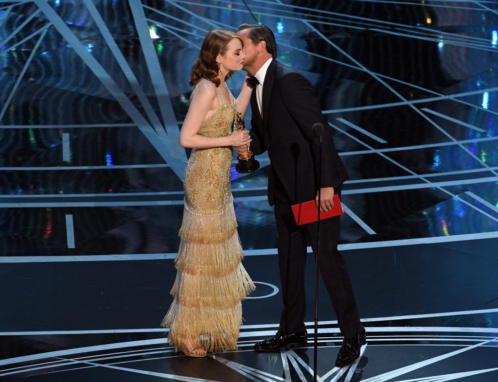 HOLLYWOOD, CA - FEBRUARY 26:  Actress Emma Stone (L) and accepts Best Actress for 'La La Land' from actor Leonardo DiCaprio onstage during the 89th Annual Academy Awards at Hollywood & Highland Center on February 26, 2017 in Hollywood, California.  (Photo by Kevin Winter/Getty Images)