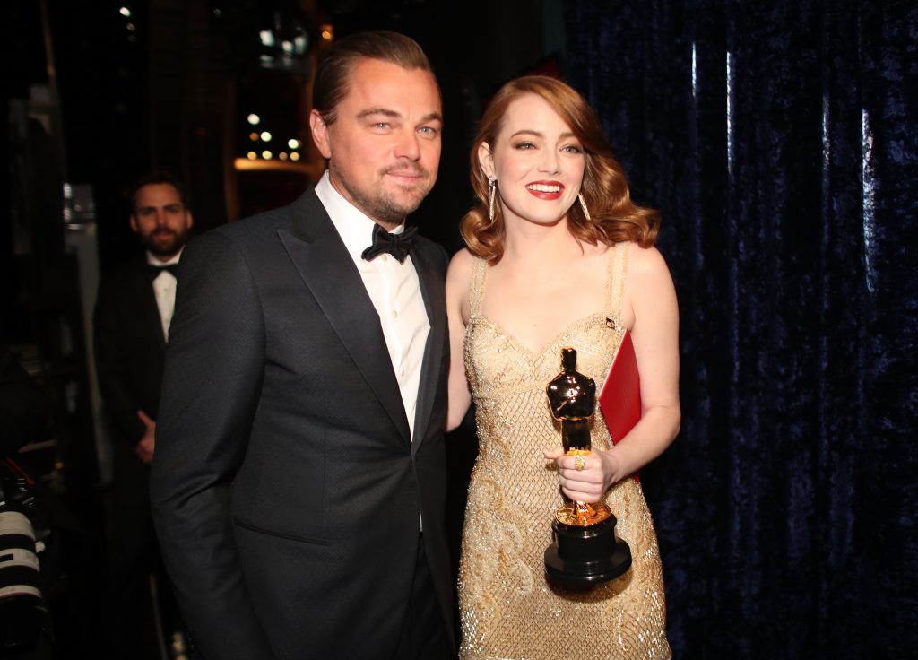 HOLLYWOOD, CA - FEBRUARY 26:  Actor Leonardo DiCaprio (L) and actress Emma Stone, winner of Best Actress for 'La La Land' pose backstage during the 89th Annual Academy Awards at Hollywood & Highland Center on February 26, 2017 in Hollywood, California.  (Photo by Christopher Polk/Getty Images)