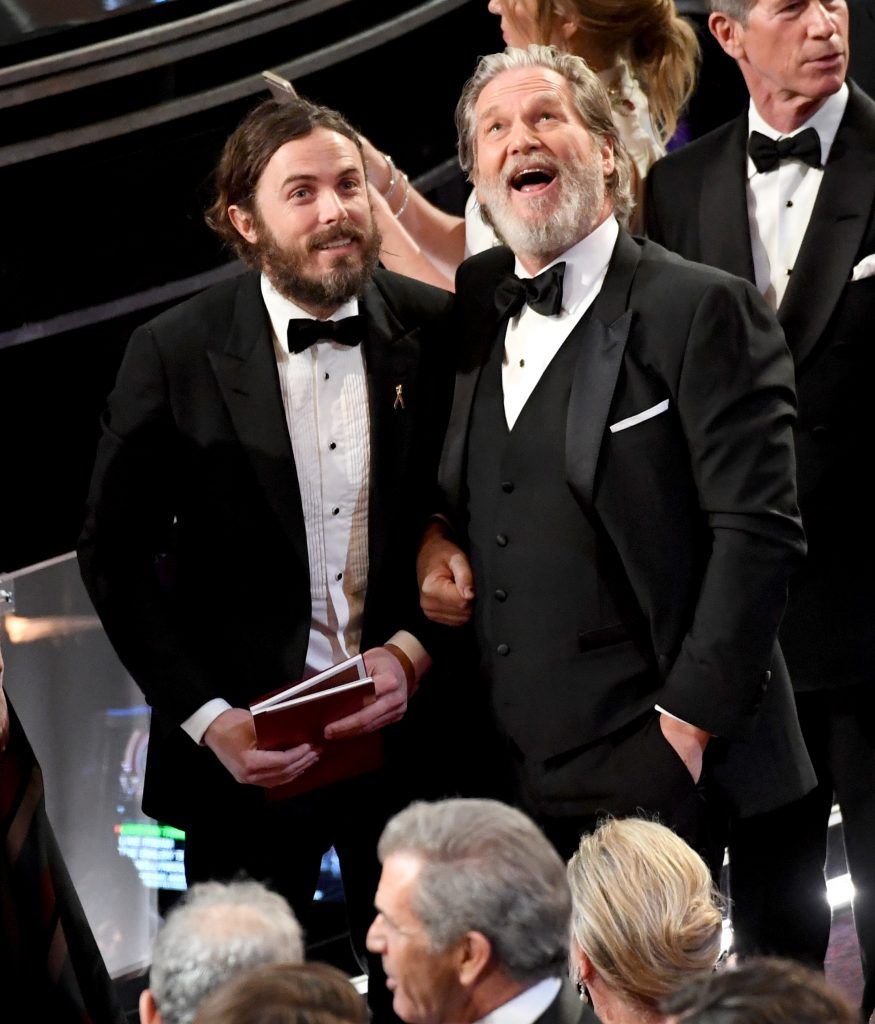 HOLLYWOOD, CA - FEBRUARY 26:  Actors Casey Affleck (L) and Jeff Bridges in the audience during the 89th Annual Academy Awards at Hollywood & Highland Center on February 26, 2017 in Hollywood, California.  (Photo by Kevin Winter/Getty Images)