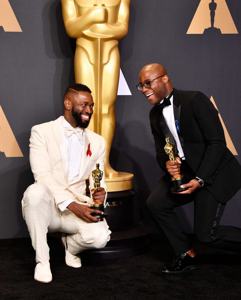 HOLLYWOOD, CA - FEBRUARY 26:  Screenwriter  Tarell Alvin McCraney (L) and writer/director Barry Jenkins, winners of Best Adapted Screenplay for 'Moonlight', pose in the press room during the 89th Annual Academy Awards at Hollywood & Highland Center on February 26, 2017 in Hollywood, California.  (Photo by Frazer Harrison/Getty Images)